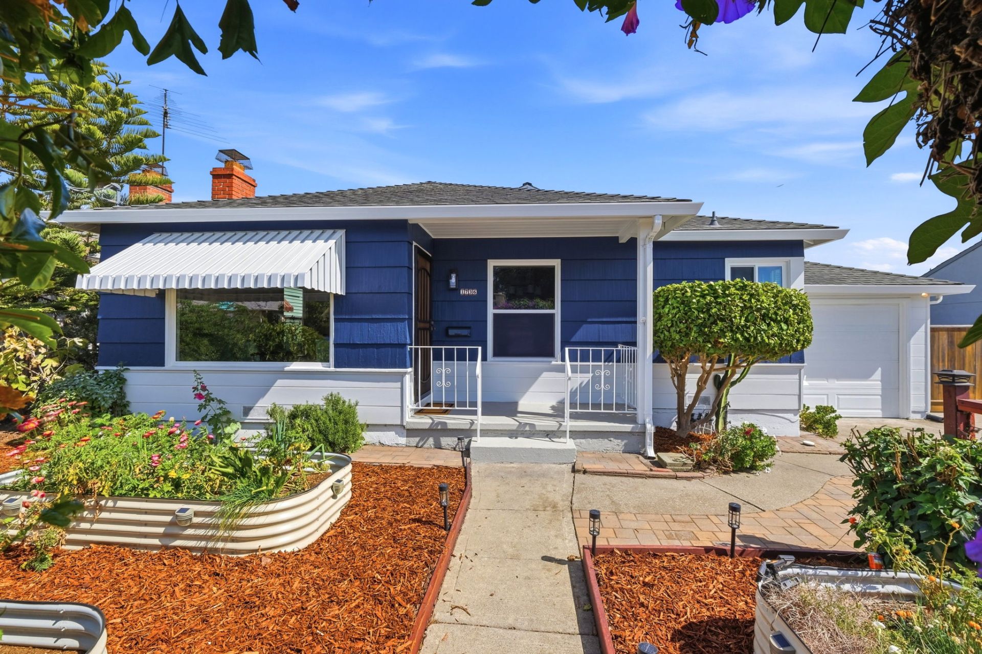 Front view of home listed by Vern McCalla at 1736 Halsey Ave, San Leandro, California.